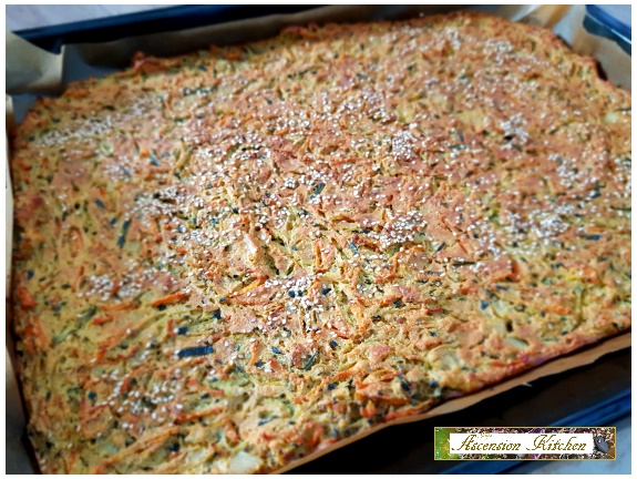 photo of a veggie bake with courgette and carrot in a baking tray